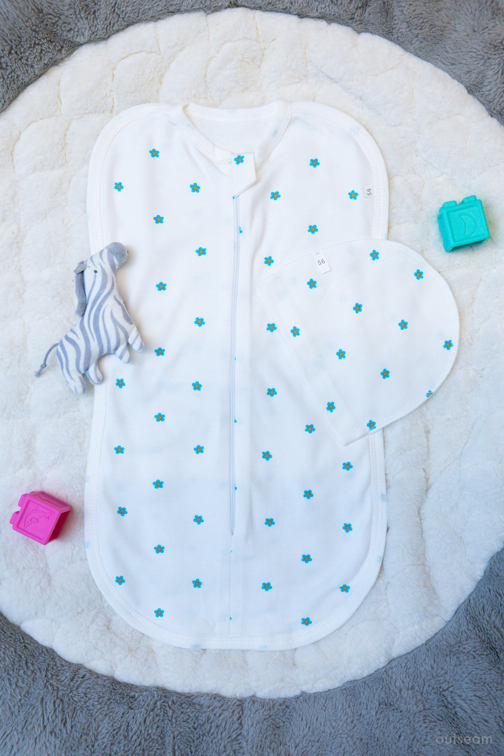 Outseam Newborn Sleep Cocoon - Flower — soft cotton baby sleep cocoon with outward seams